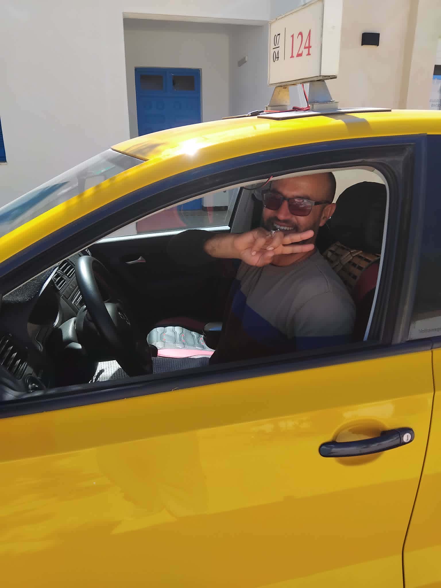 Marwen Gzam with his taxi in Djerba – airport transfers and private island tours